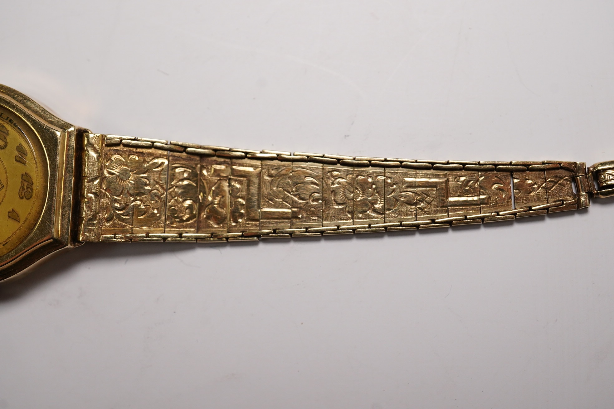 A lady's 14k manual wind wrist watch, on a 14k bracelet, gross weight 14 grams. Condition - poor to fair